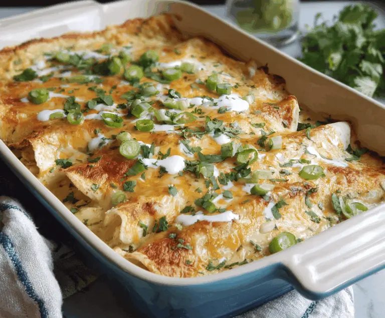 Delicious low carb white chicken enchiladas served on a plate with melted cheese and fresh cilantro, perfect for a healthy dinner option