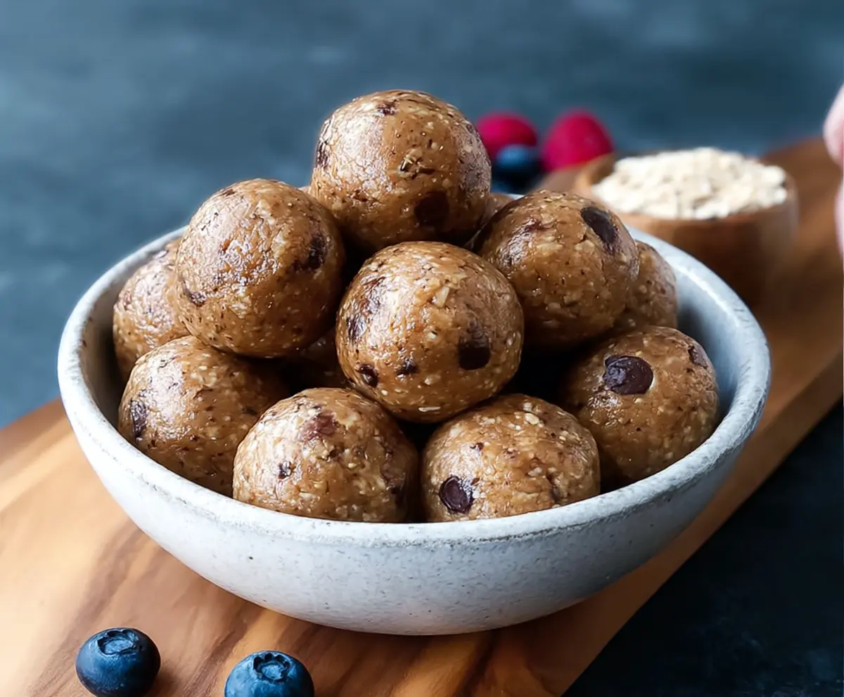 Nutritious Kodiak Cakes protein balls with oats and chocolate chips on a white background