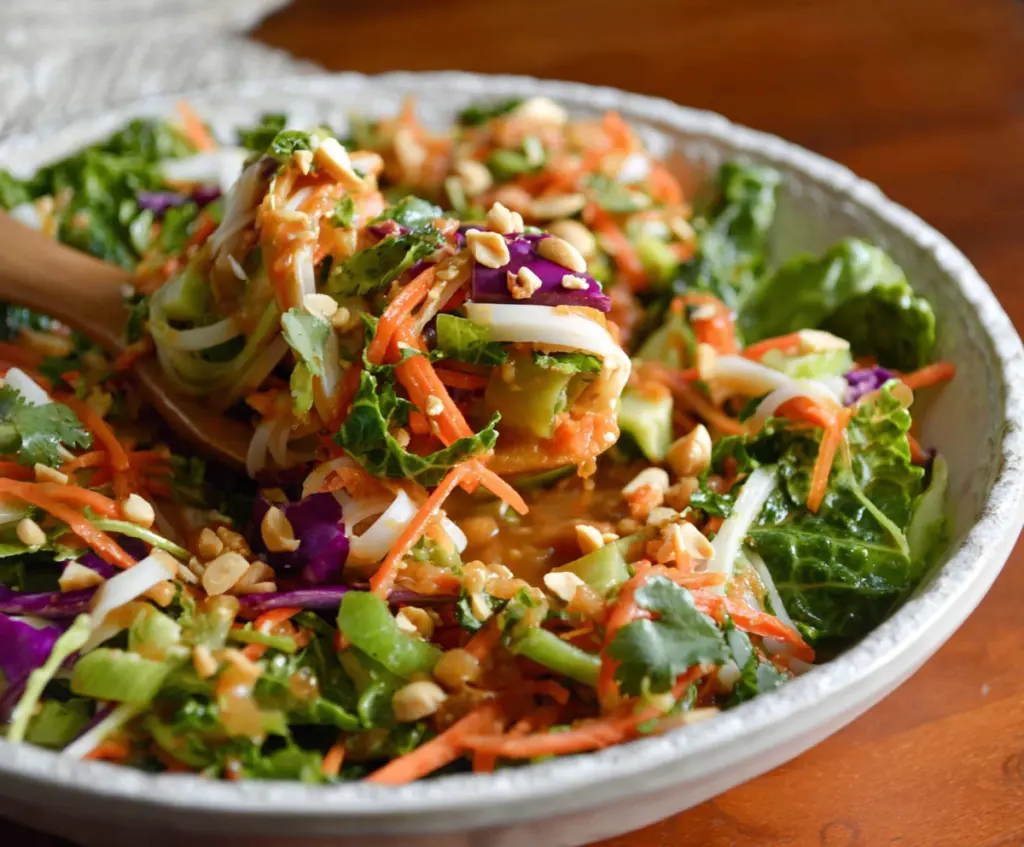 Fresh Spring Roll Salad with crunchy vegetables and peanut dressing, perfect for a light and healthy meal.